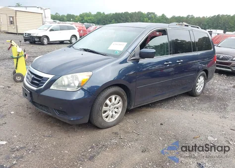2010 Honda Odyssey Ex-L z USA, uszkodzony, nr VIN 5FNRL3H70AB101916